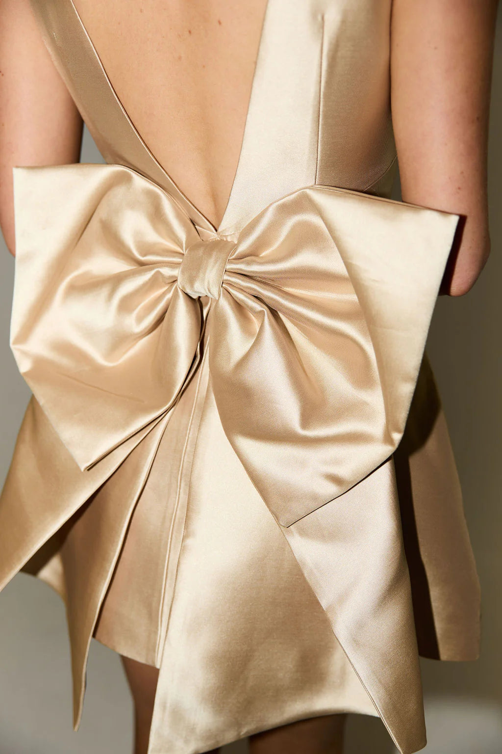 Hire ODD MUSE The Ultimate Muse Bow Detail Mini Dress in Gold